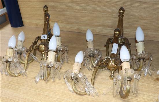 Two pairs of two branch gilt metal wall sconces